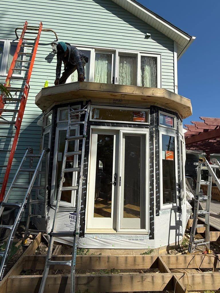 Beautiful Overhang Addition and Flat Roof Installation in Medina image