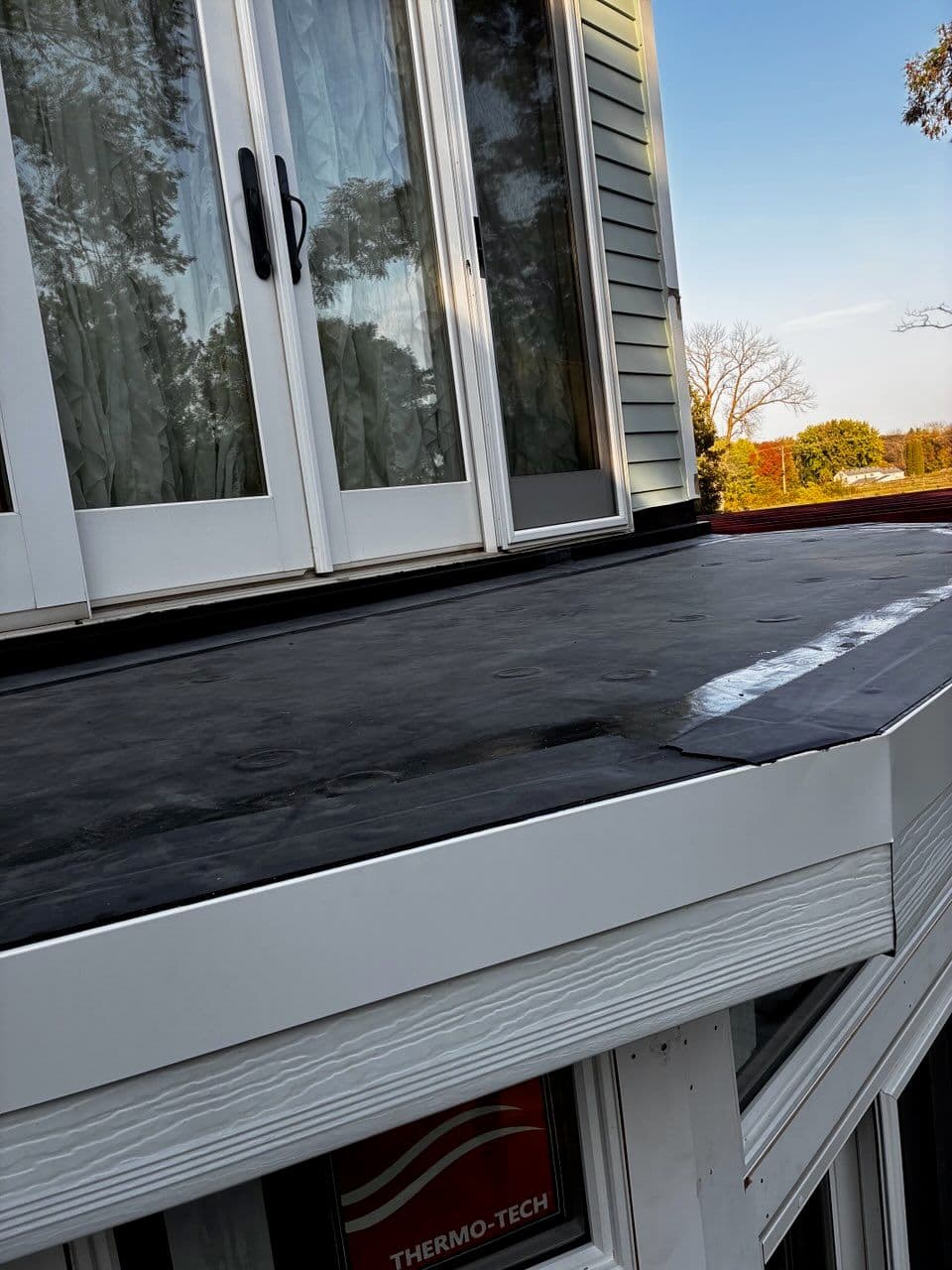 Gallery photos for Beautiful Overhang Addition and Flat Roof Installation in Medina: Image #1