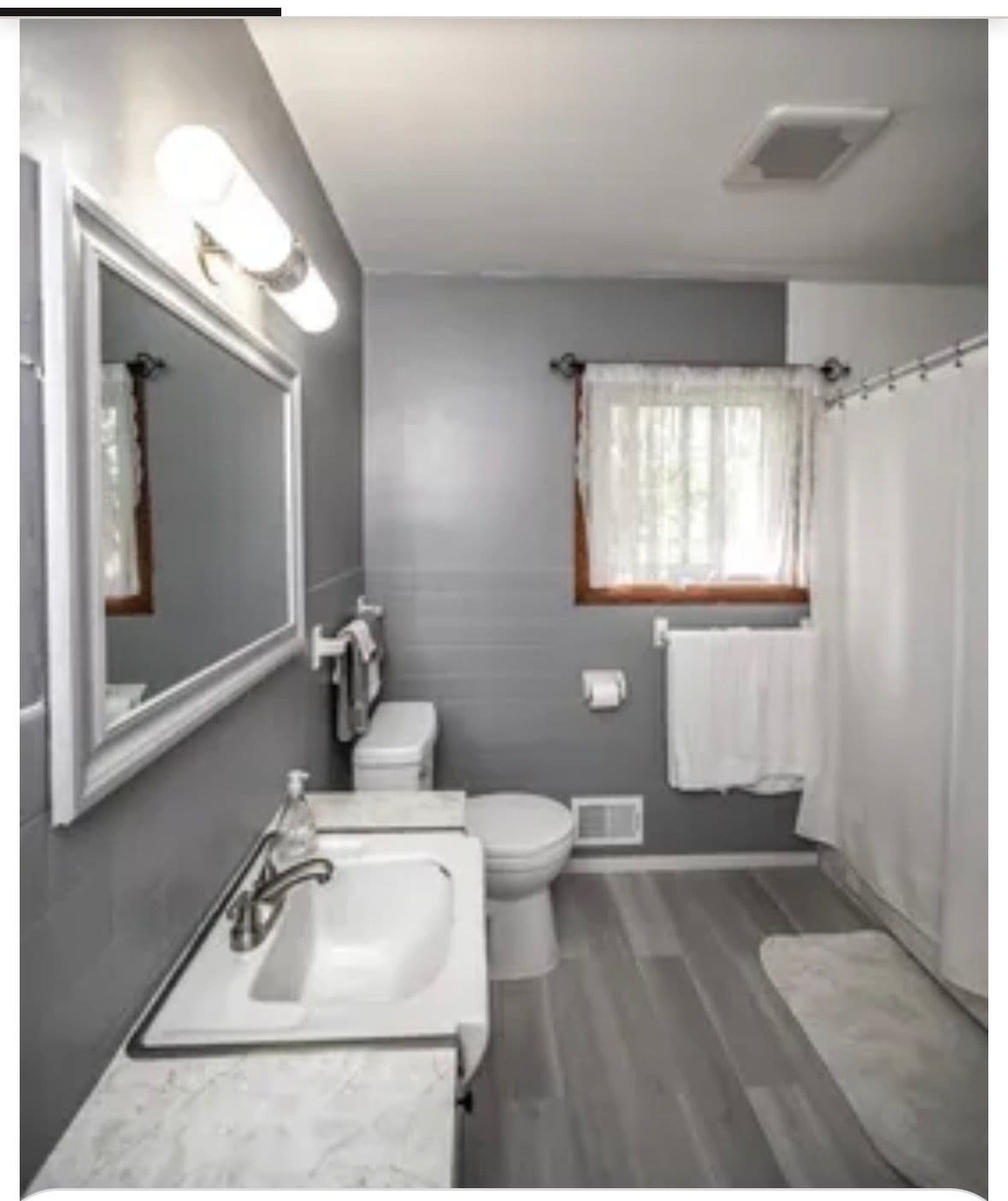 Project Two Bathroom Remodels in Bloomington That Show Our Range image