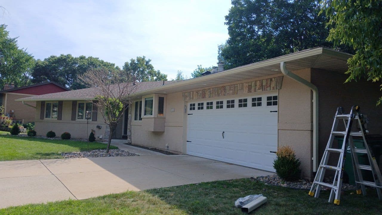 Enhanced Home Protection with New Shingles and Gutters
